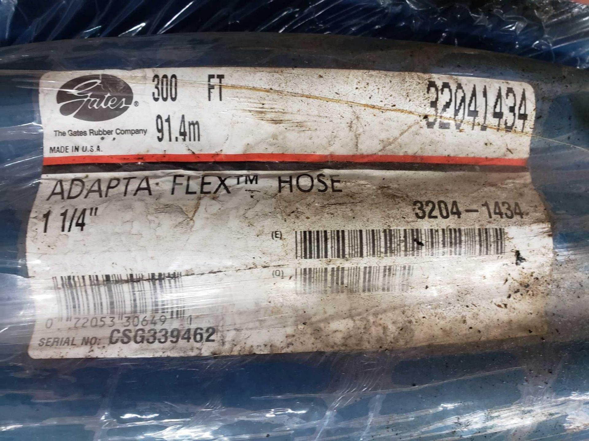Gates 1 1/4" adapta-flex hose. Model 320411434. Marked as 300ft. New in roll. - Image 2 of 2