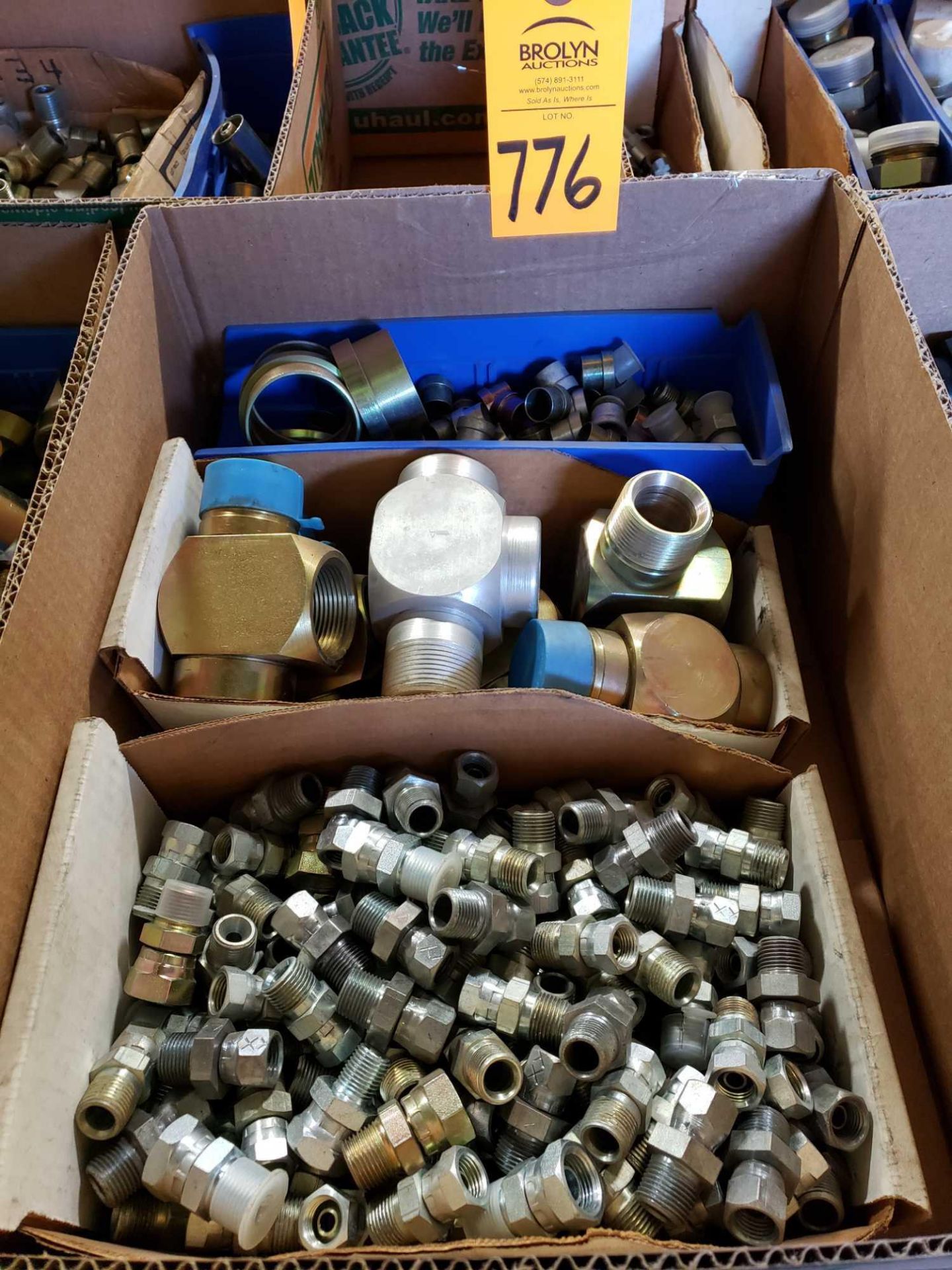 Assorted hydraulic fittings as pictured. New.