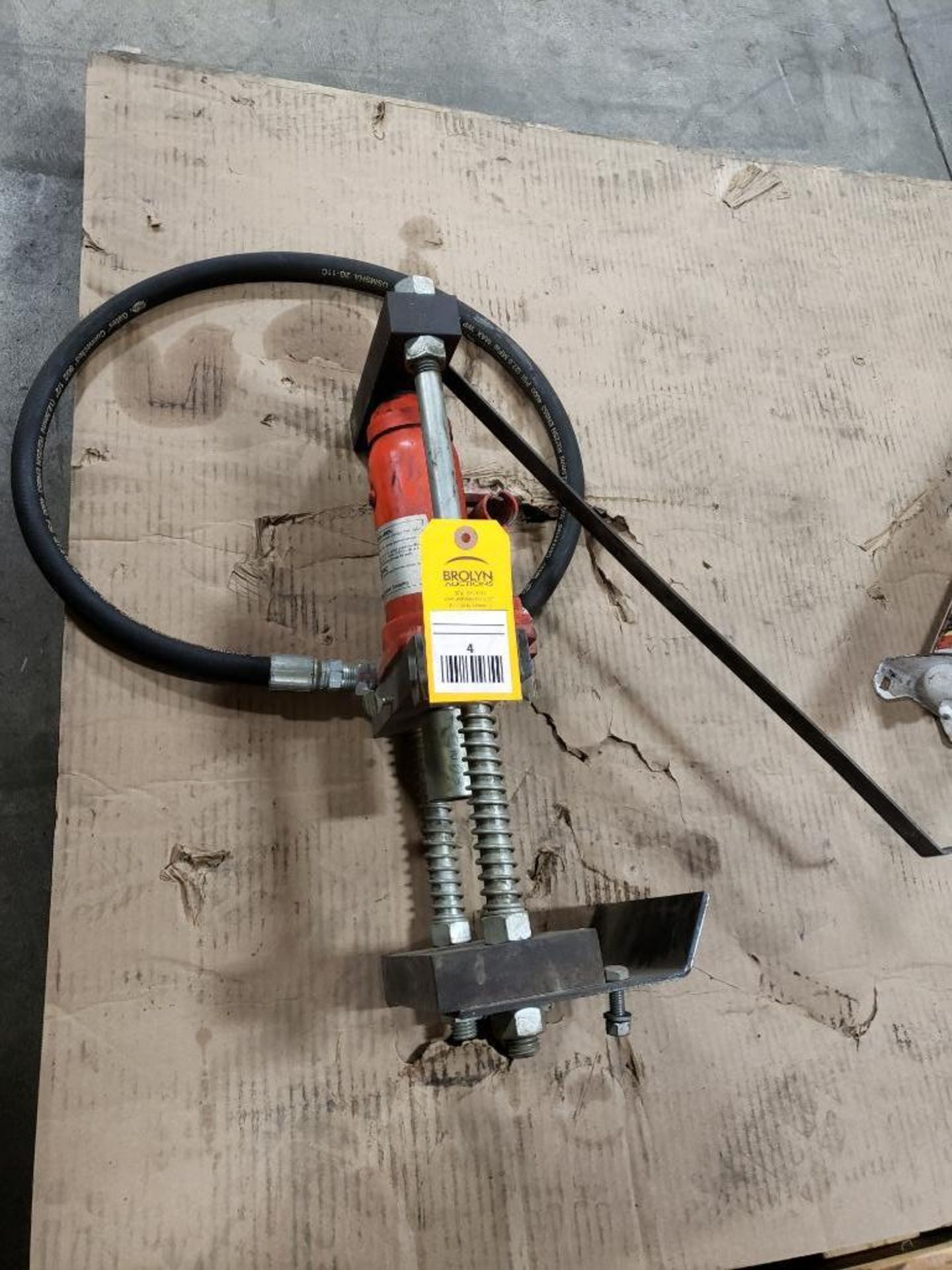 Hydraulic hose end crimping unit.