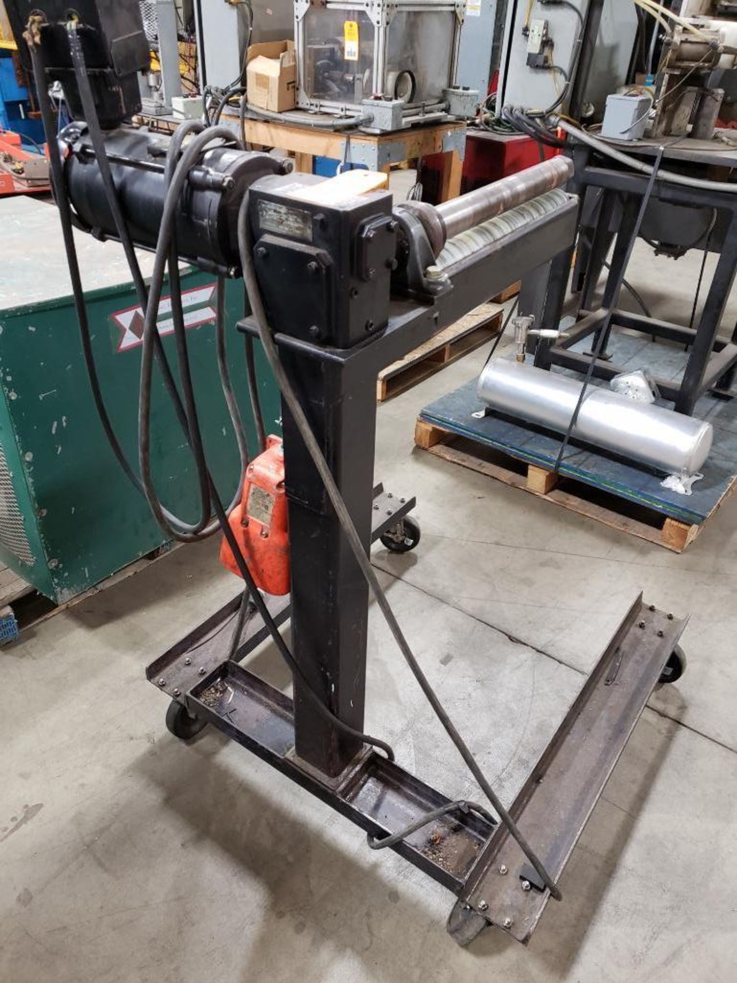 Belt slitting unit with foot control.