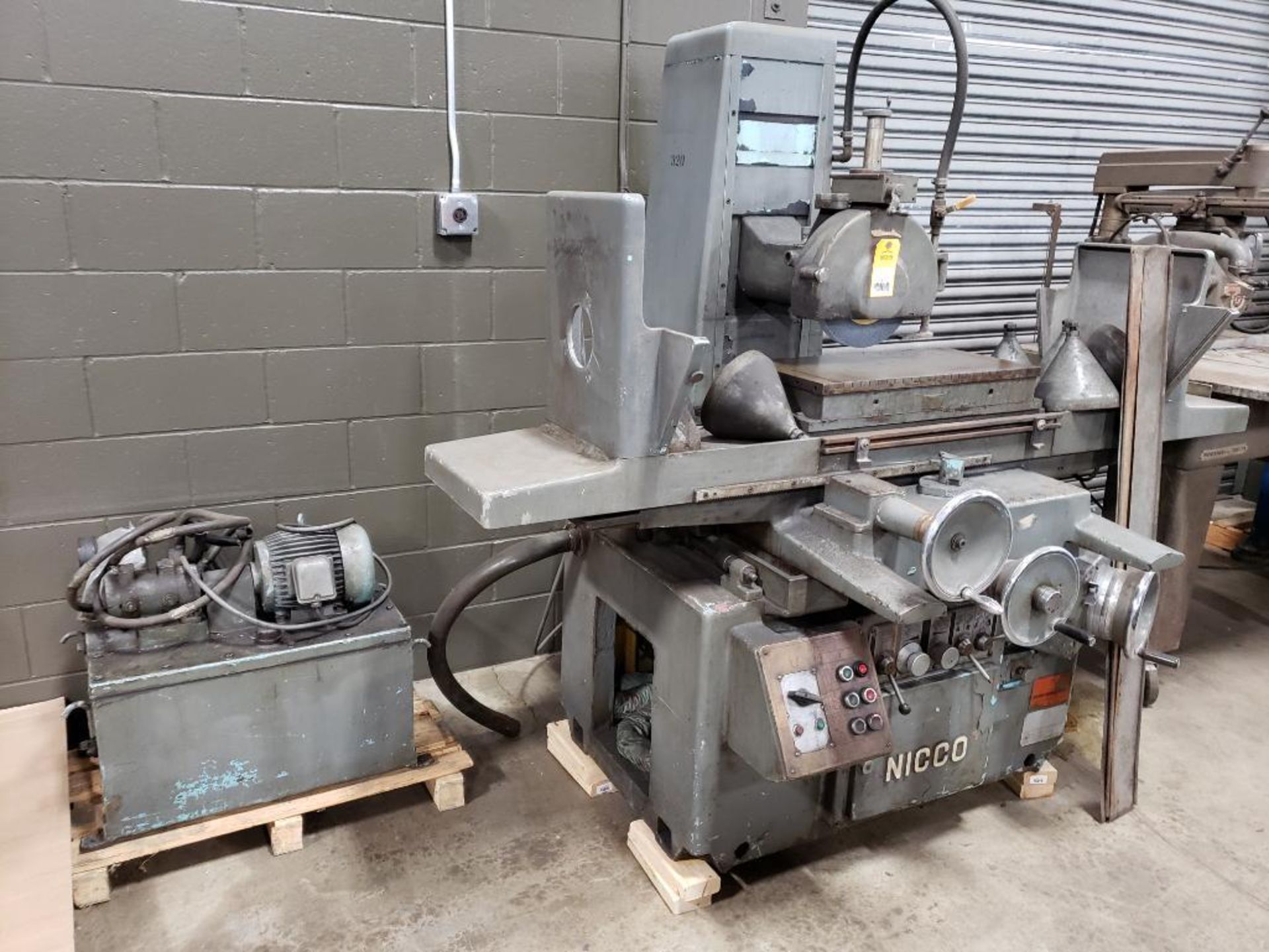 Nikko Hydraulic surface grinder. 11 1/2"x24" electomagnetic chuck.