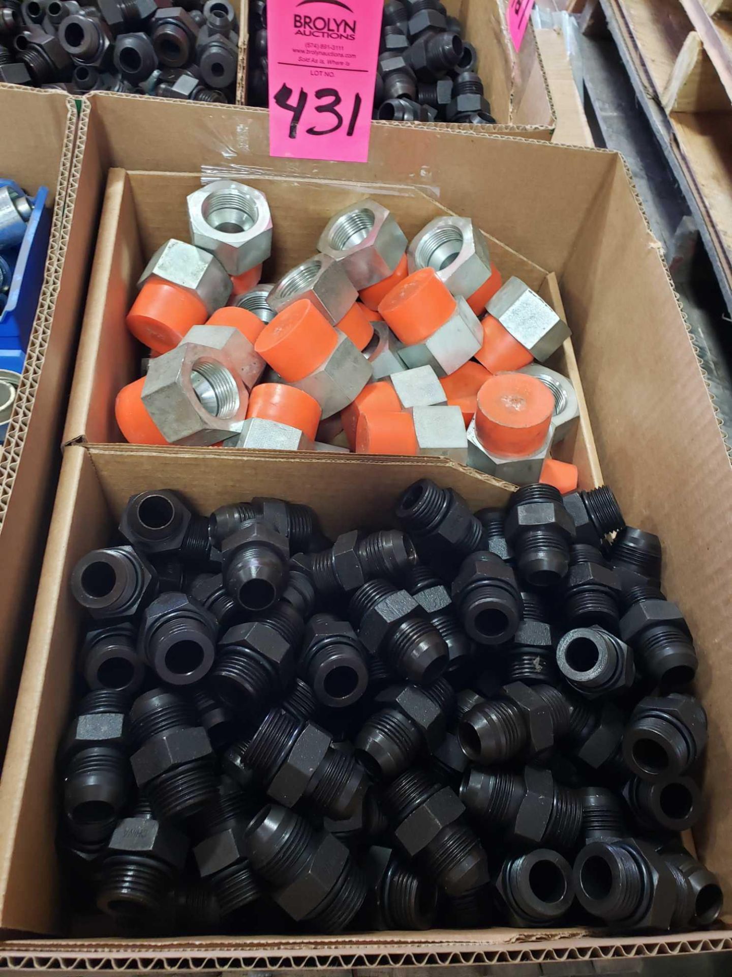 Lot of assorted hydraulic fittings. New as pictured.