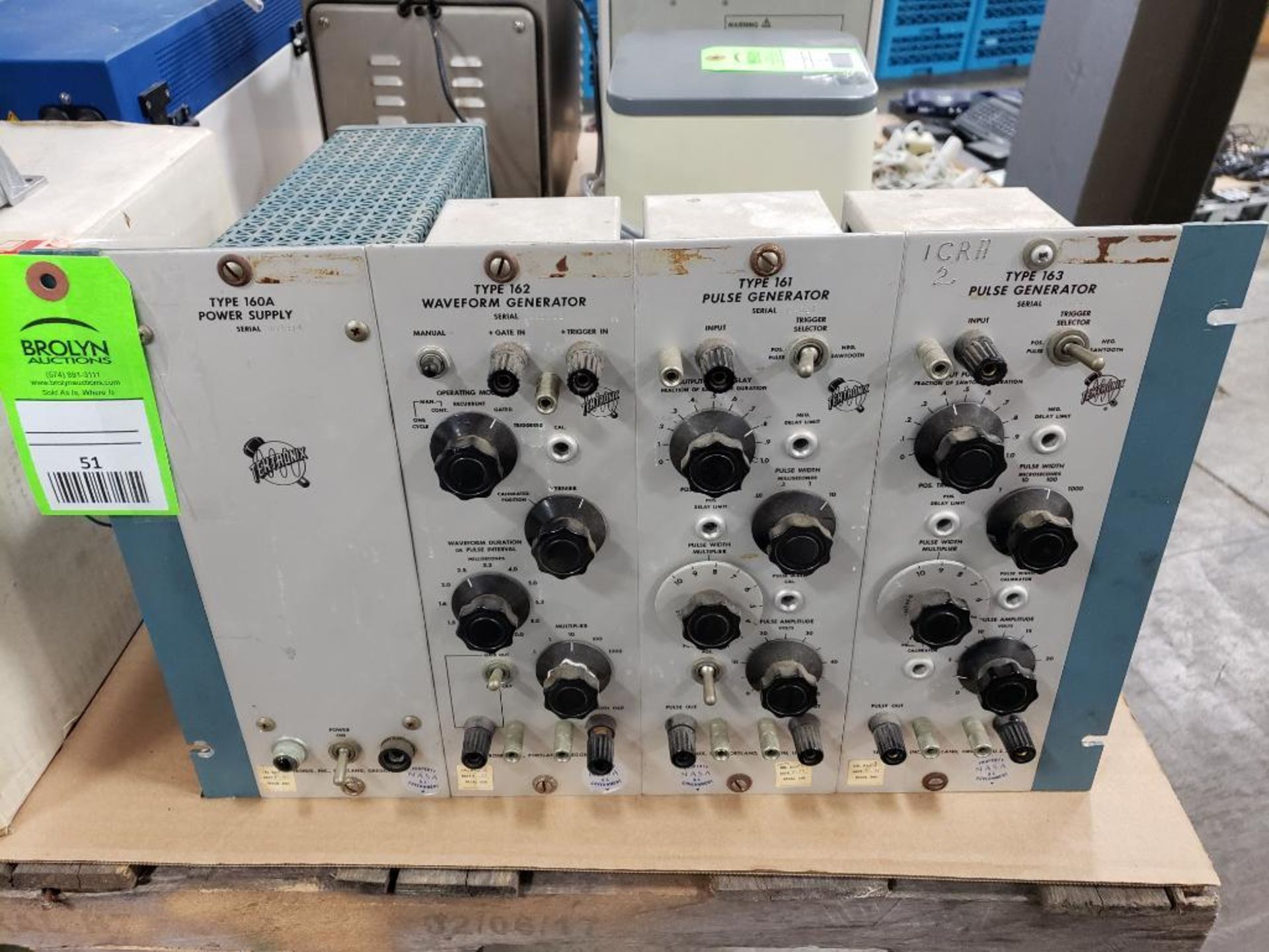 Tektronix rack with assorted components as pictured.