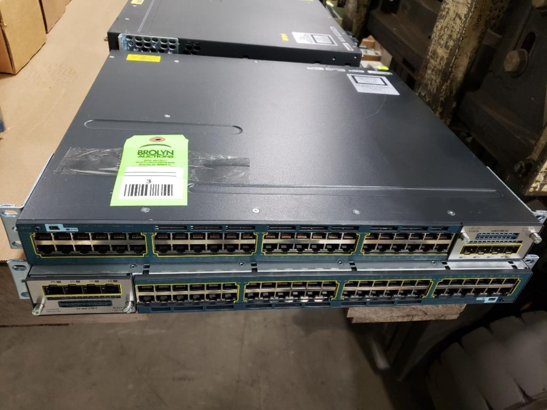 Qty 2 - Cisco network gibabit switches. Model tny-ws3750x-3560x.