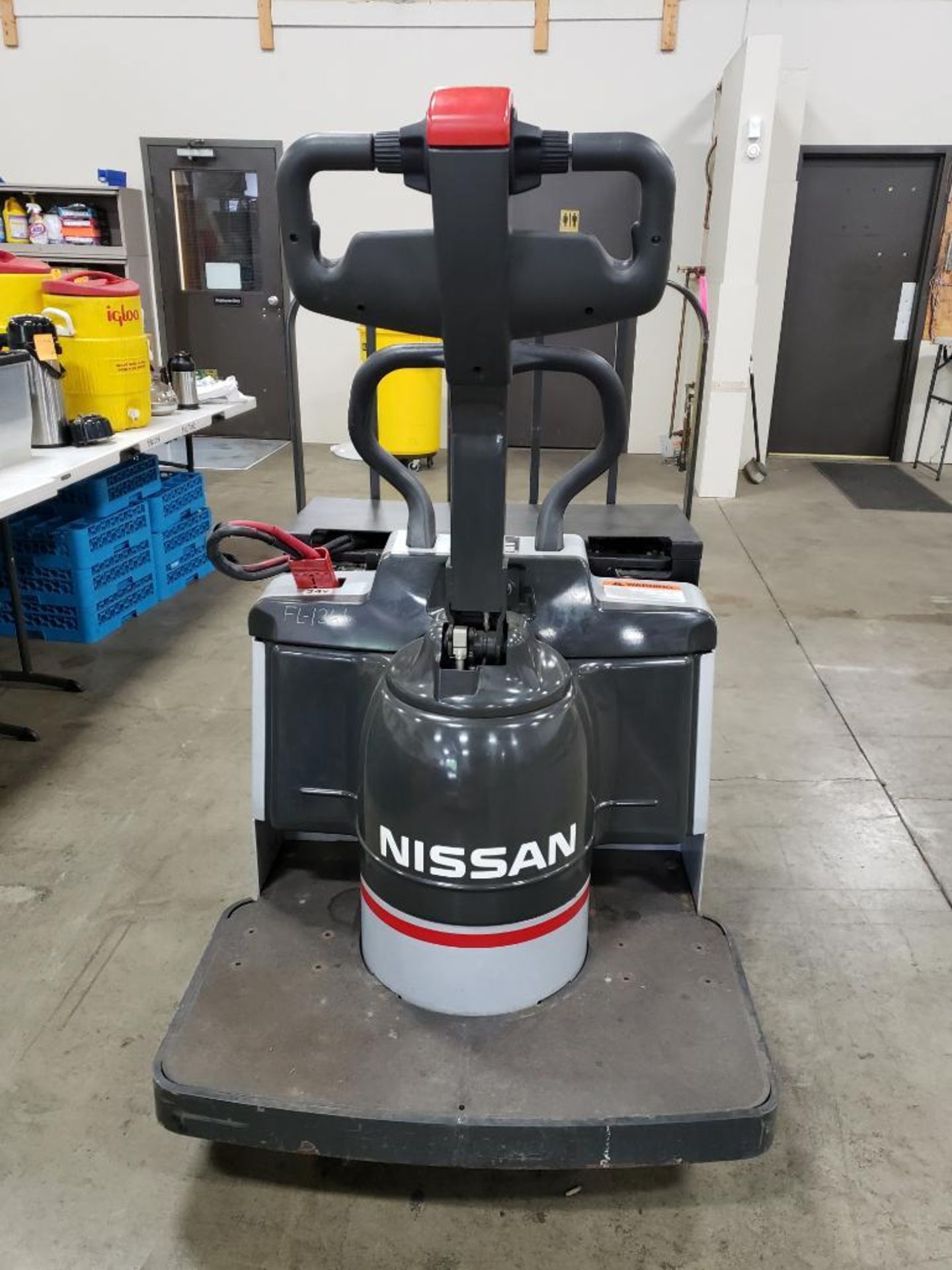 8000lb cap. Nissan 24 volt ride on power pallet jack. 143 hr. Model RPTT1W2G80NV. Extra long forks. - Image 10 of 10