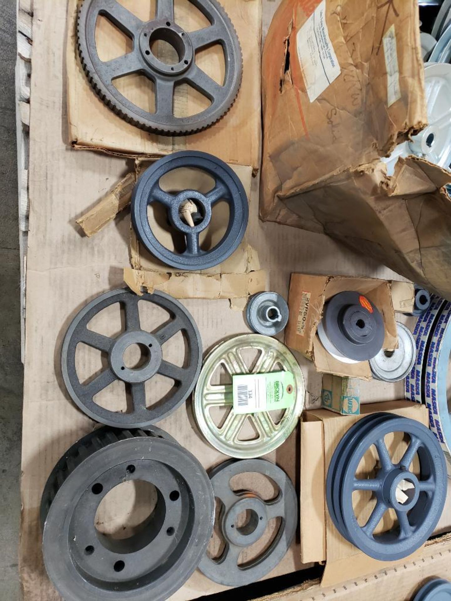 Pallet of assorted bushings, sprockets, pulleys, etc. Most are new old stock. - Image 2 of 4