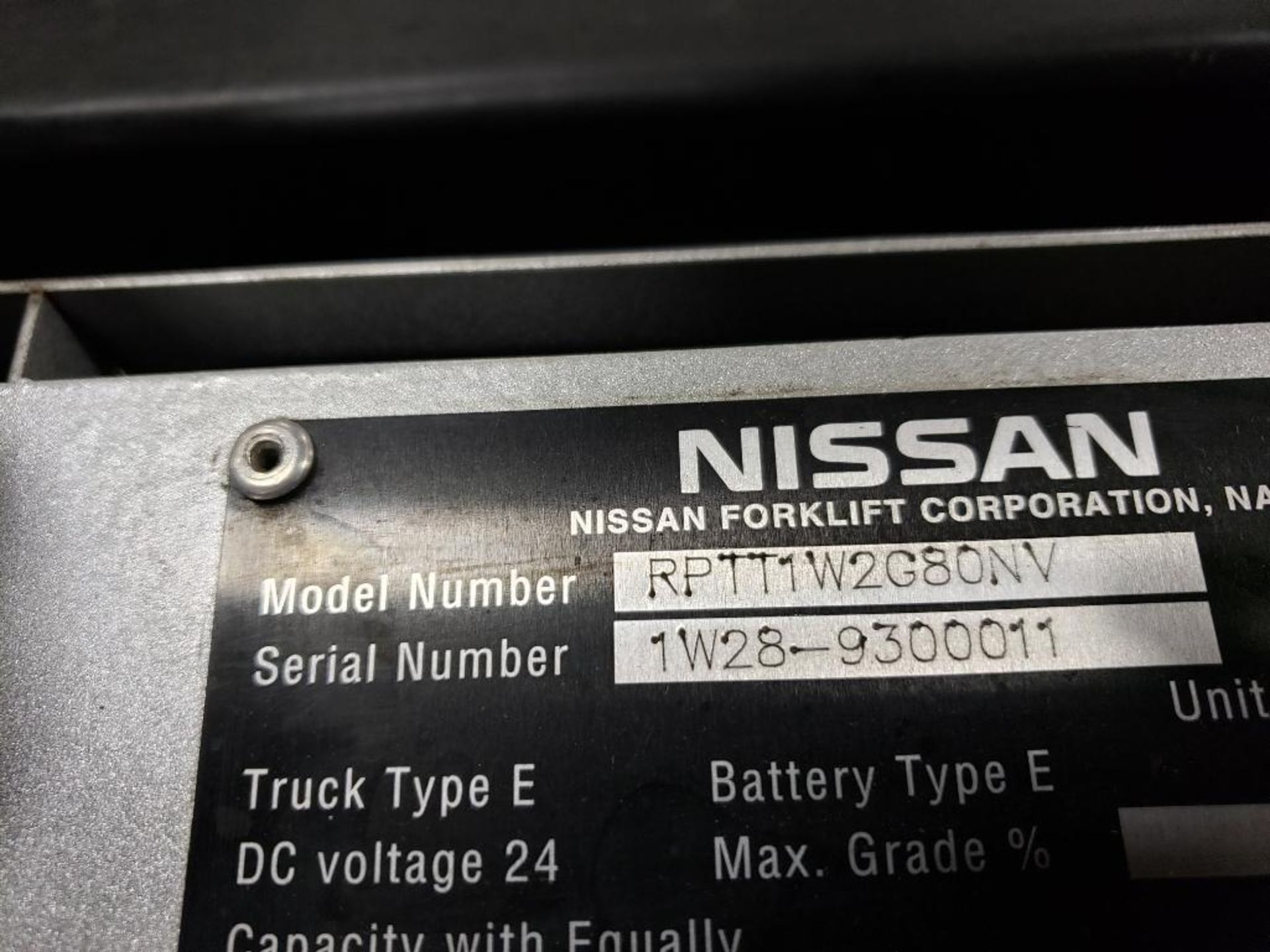 8000lb cap. Nissan 24 volt ride on power pallet jack. 143 hr. Model RPTT1W2G80NV. Extra long forks. - Image 6 of 10