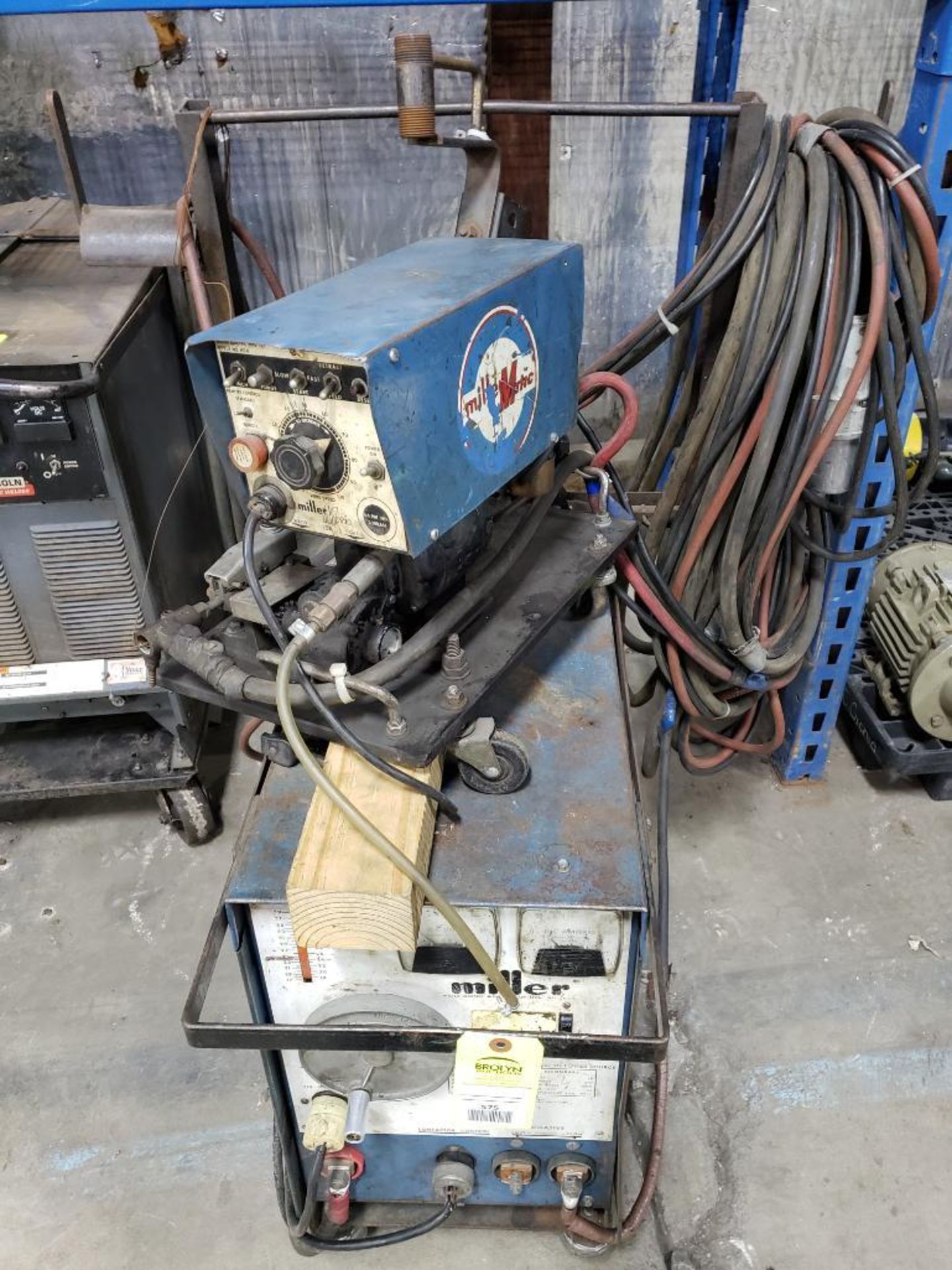 Miller welder model CP-200 with wire feeder.