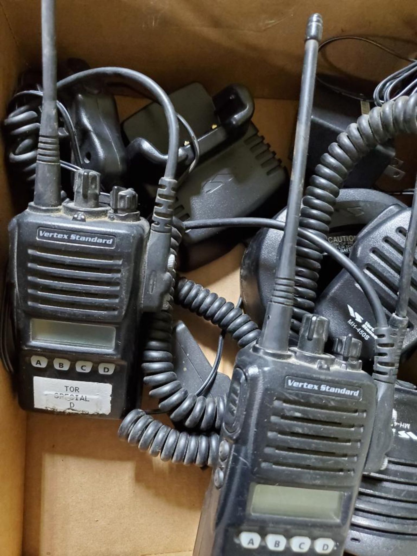 Large assortment of walkie talkies.