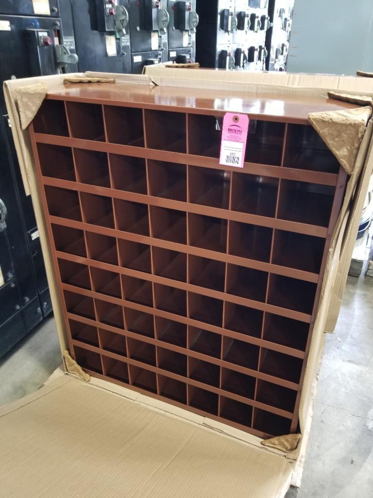 Metal pigeon hole cabinet. New in box.