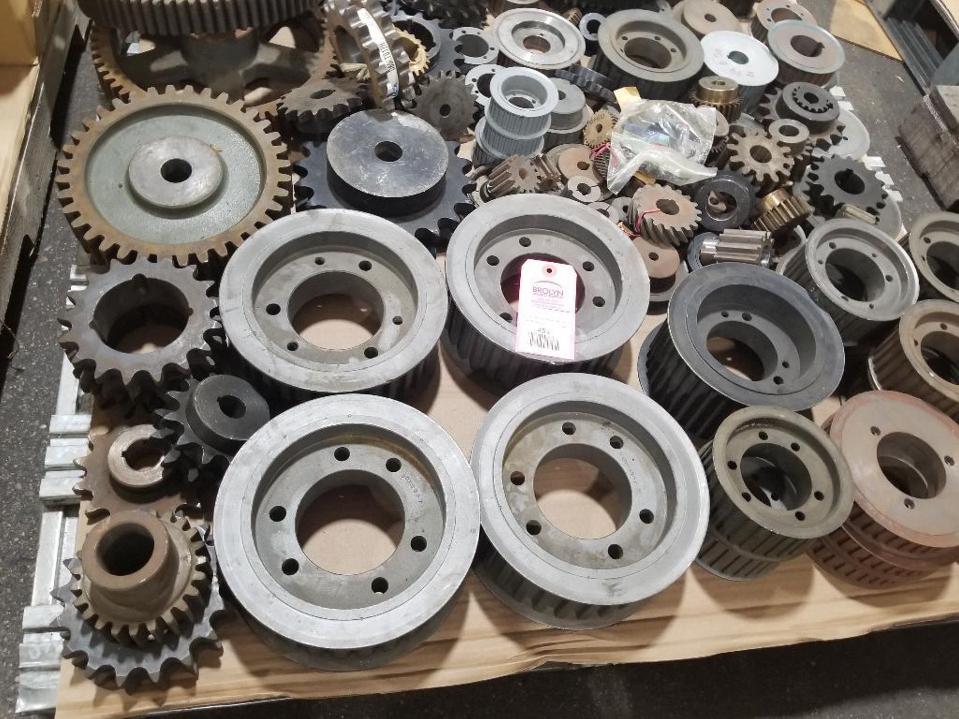 Pallet of assorted gears, pulleys, and bushings. Most new old stock. - Image 2 of 4