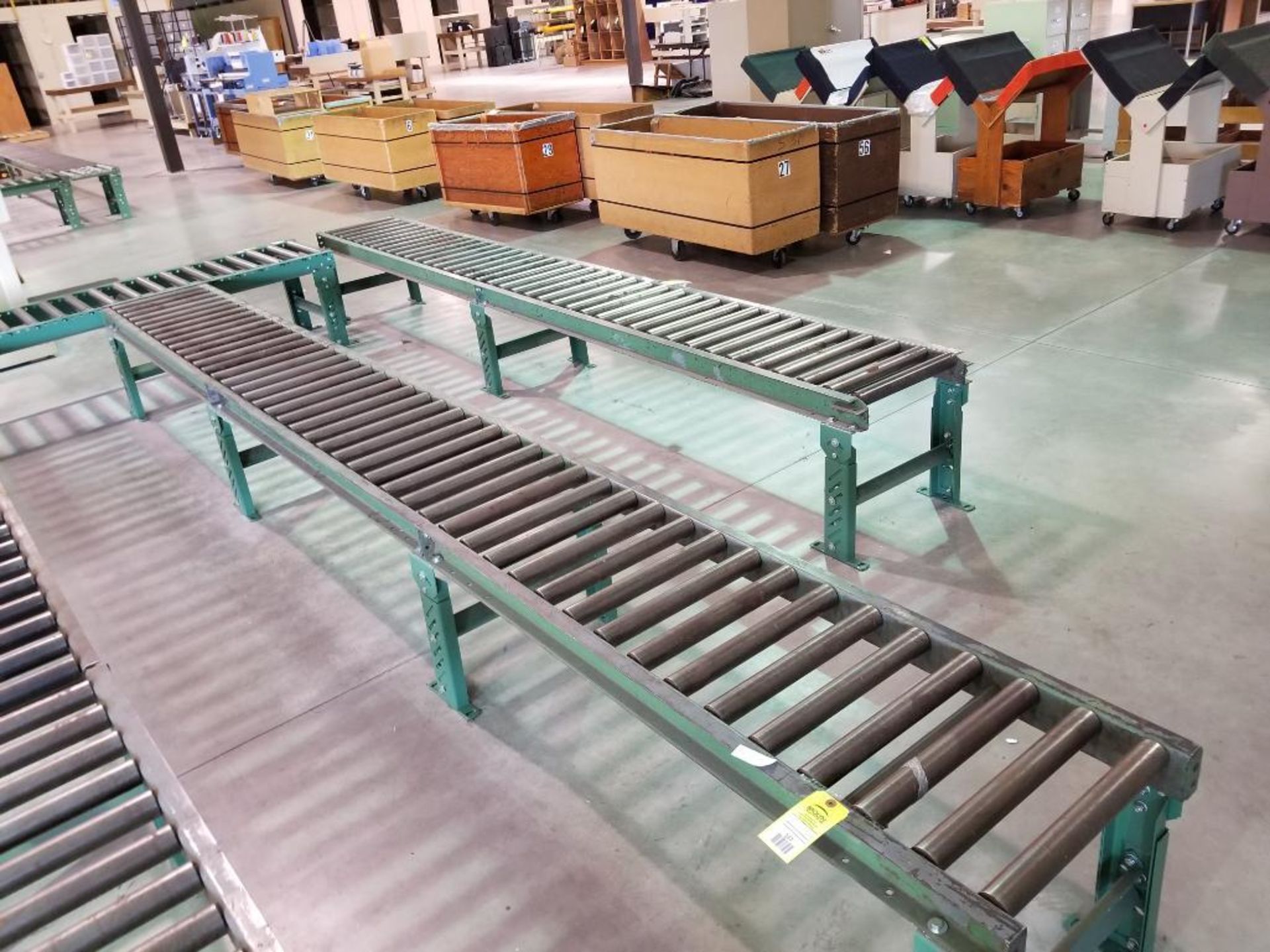 15ft roller conveyor section. 20in wide by 20in tall. (legs are adjustable to change height)