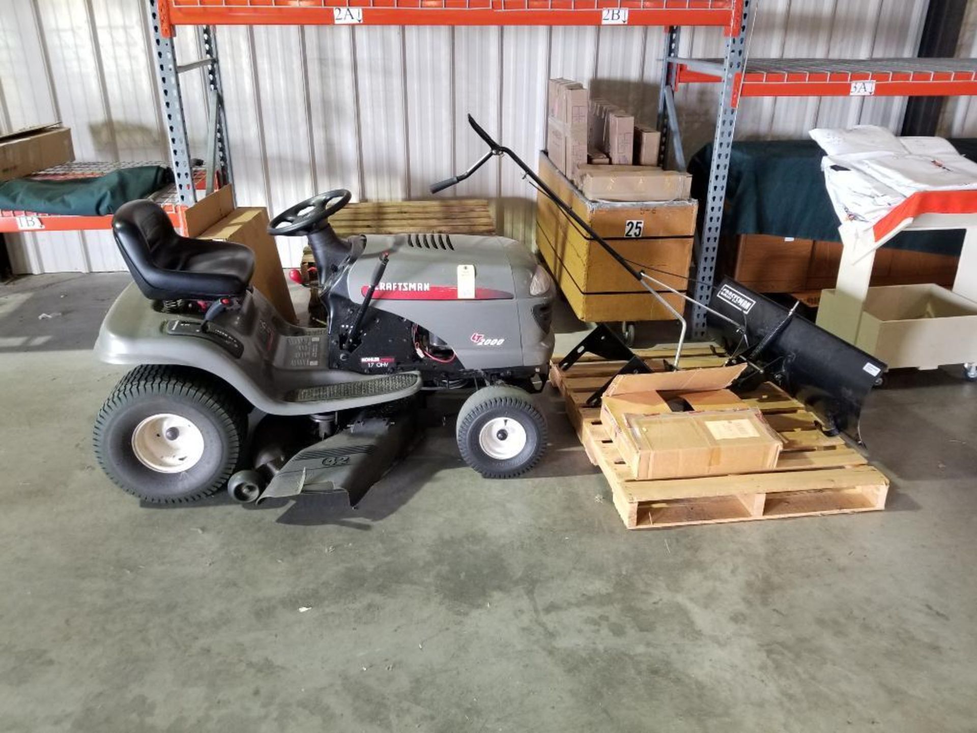 Craftsman riding lawnmower. LT2000, Kohler PRO 17hp engine. Includes snow blade and tire chains.