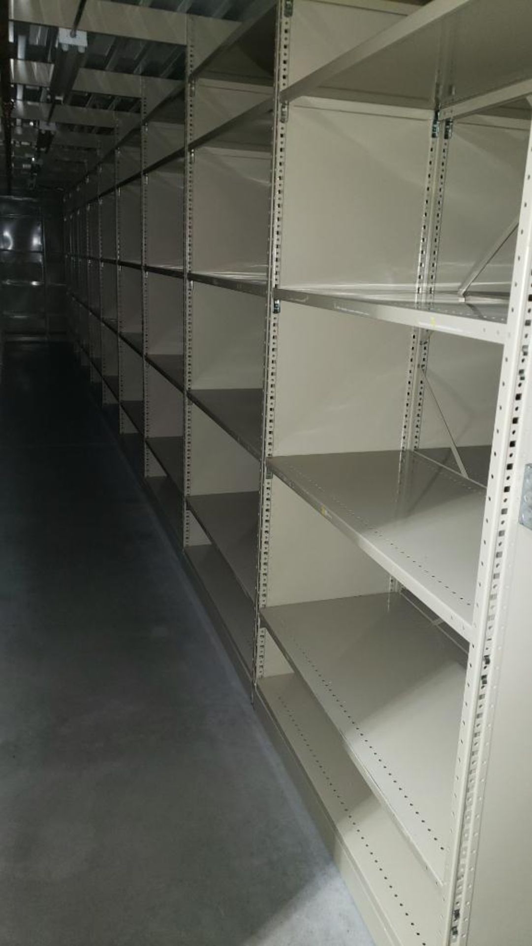 Qty 18 - Sections of shelving: Single shelf dimensions 97" tall X 48 1/32" wide X 21 1/16" deep.