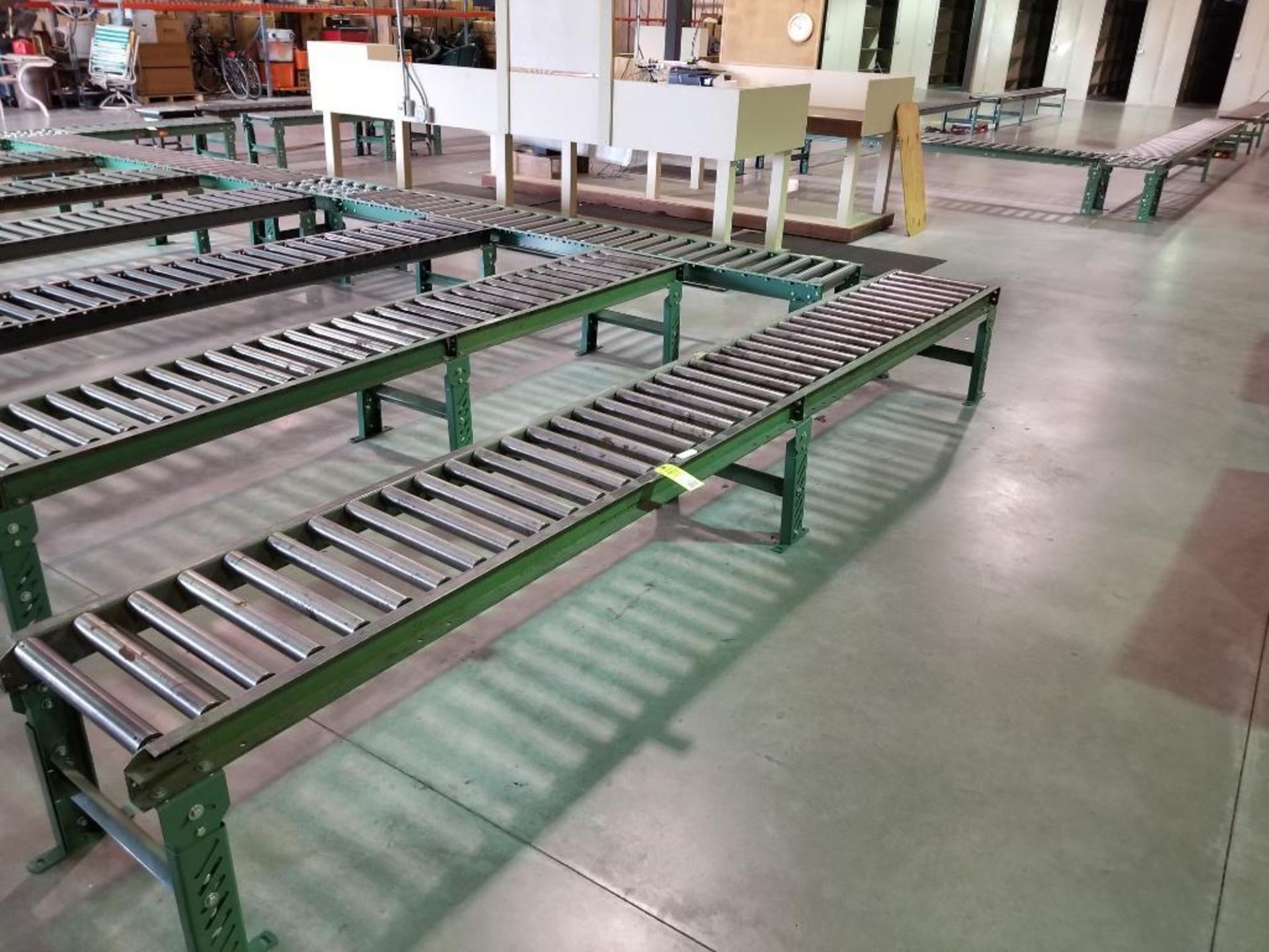 13ft roller conveyor section. 20in wide by 20in tall. (legs are adjustable to change height)