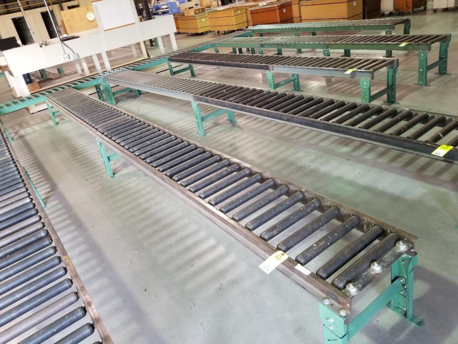 20ft roller conveyor section. 18in wide by 20in tall. (legs are adjustable to change height)