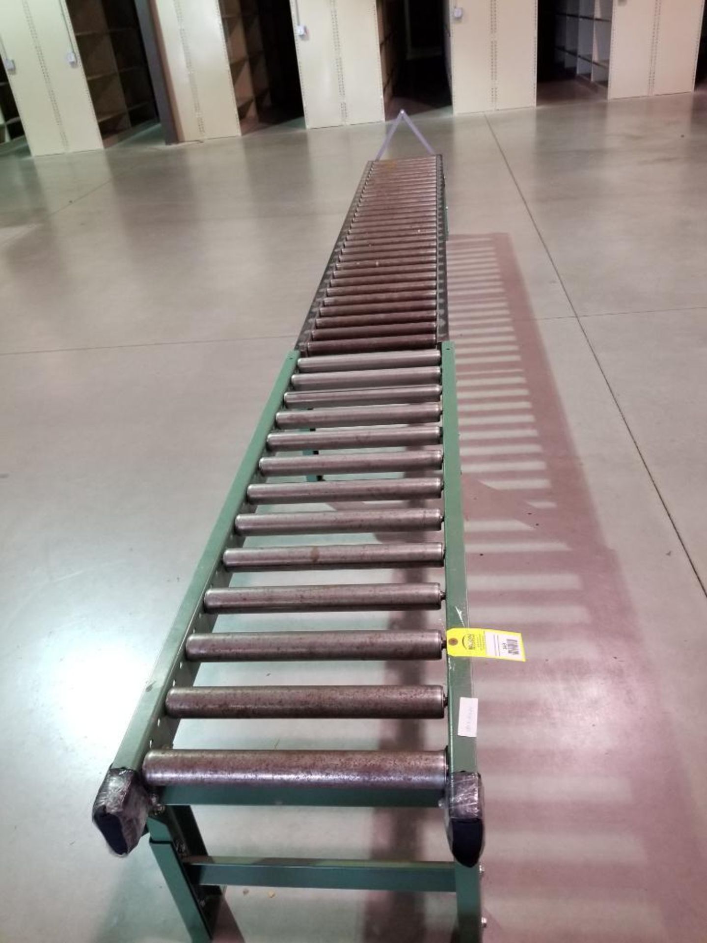 15ft roller conveyor section. 20in wide by 20in tall. (legs are adjustable to change height) - Image 2 of 2