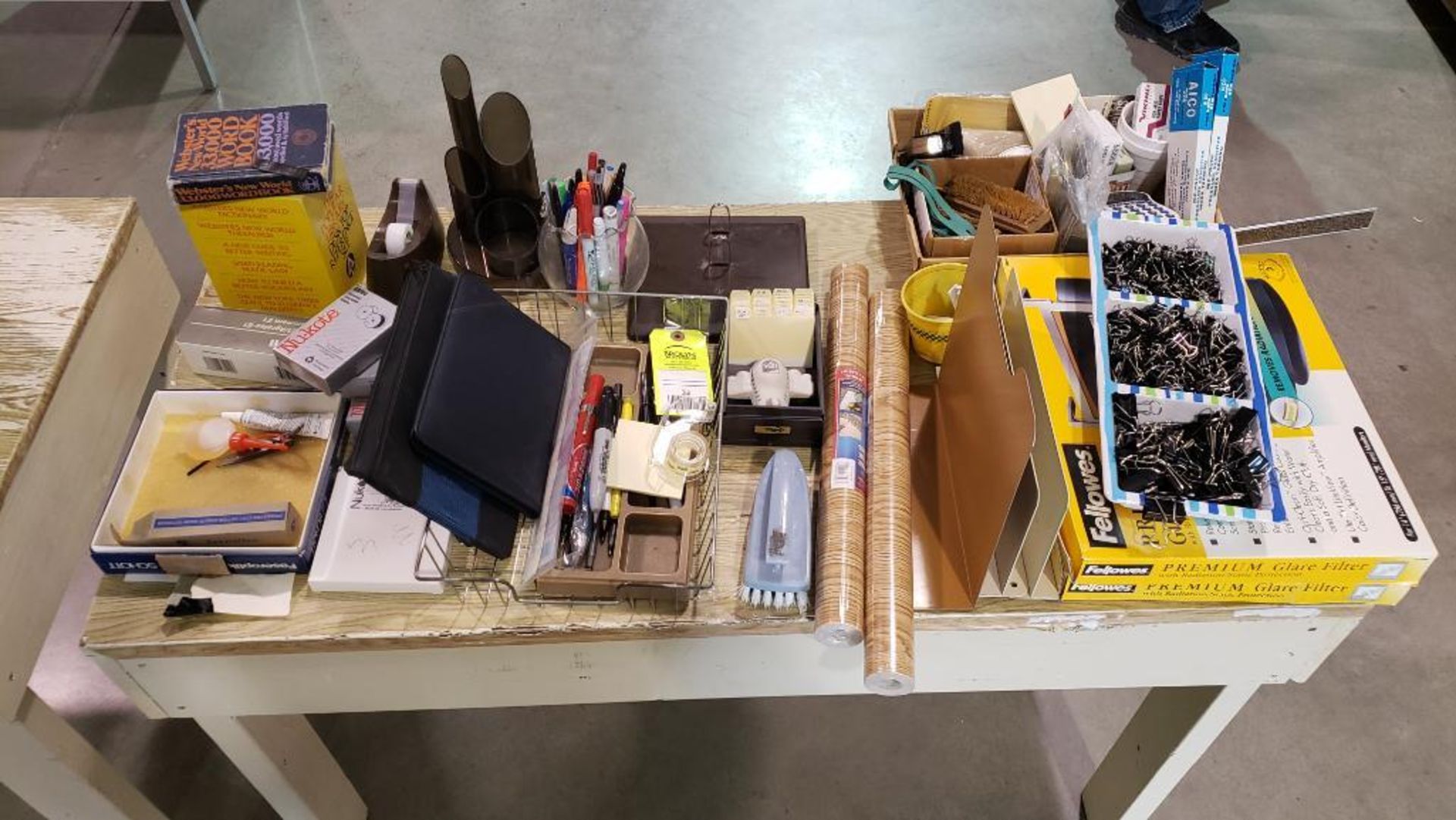 Contents of table. Assorted office items.