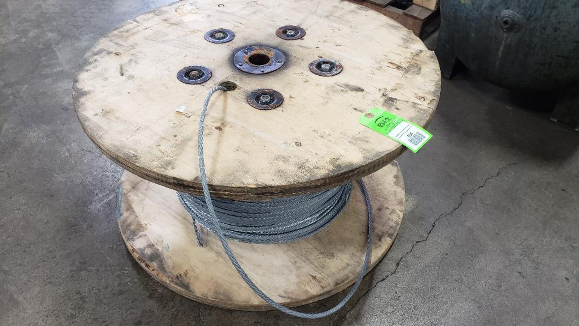 Spool of steel cable. Marked as 7.6mm cable.