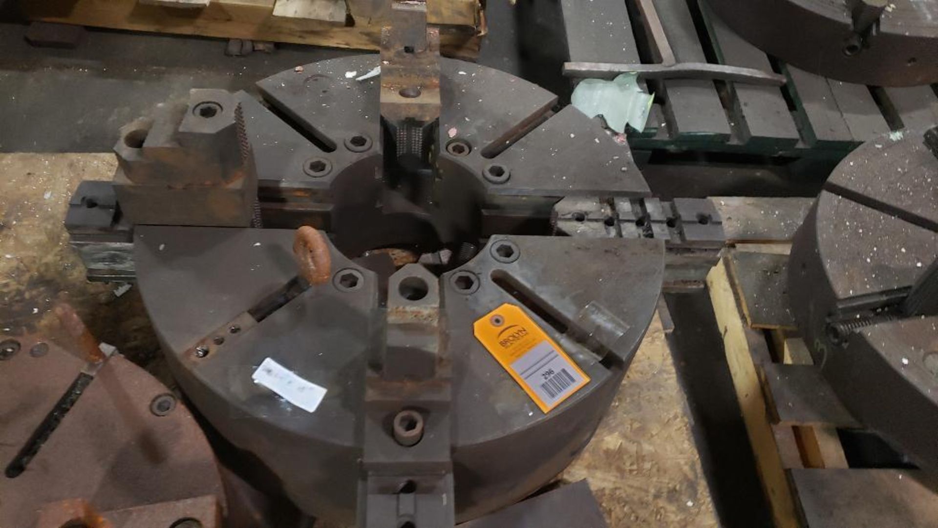 24" 4-jaw chuck.