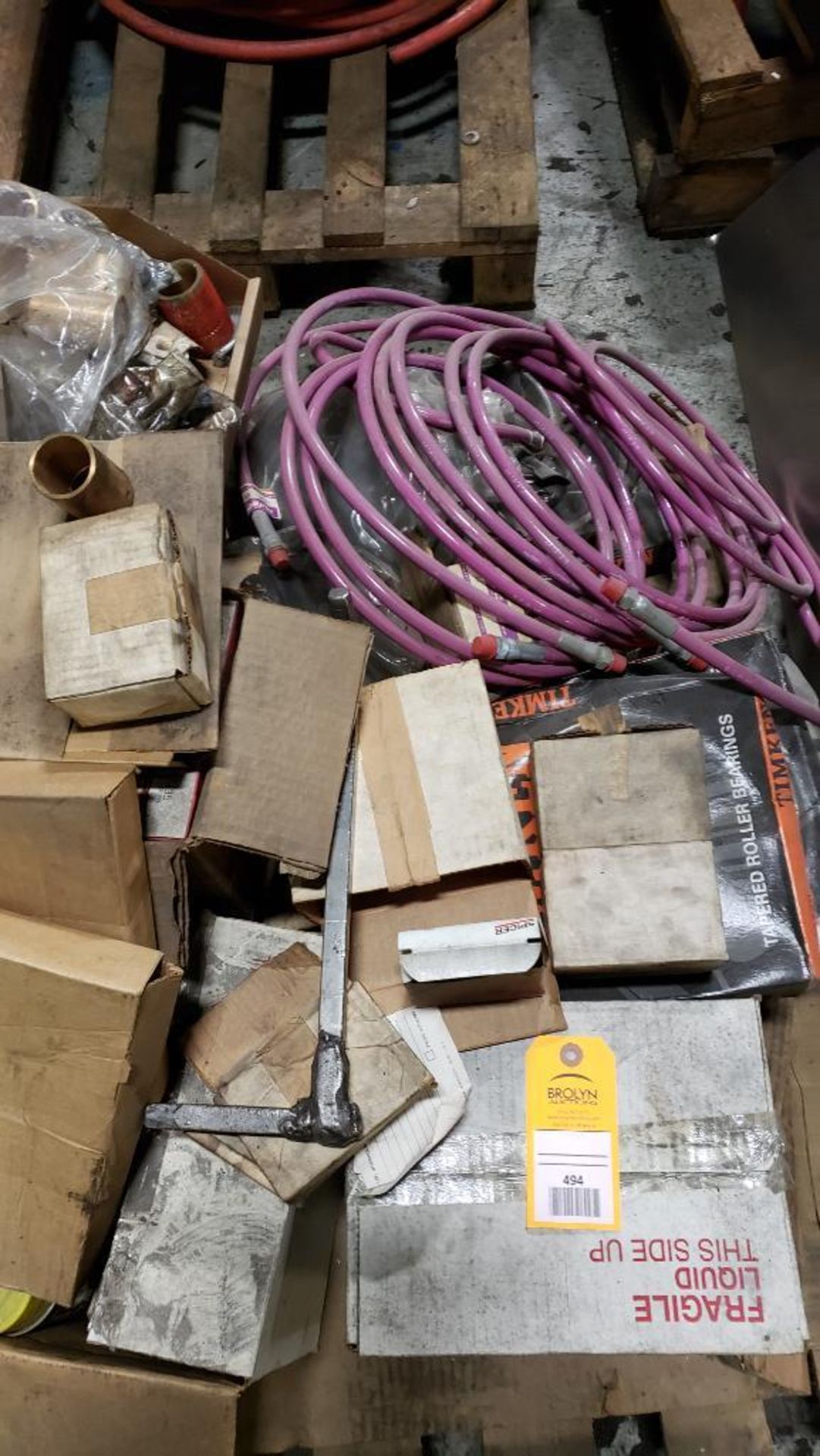 Pallet of assorted parts including bearings, brass, new hoses, and other parts. - Image 2 of 6