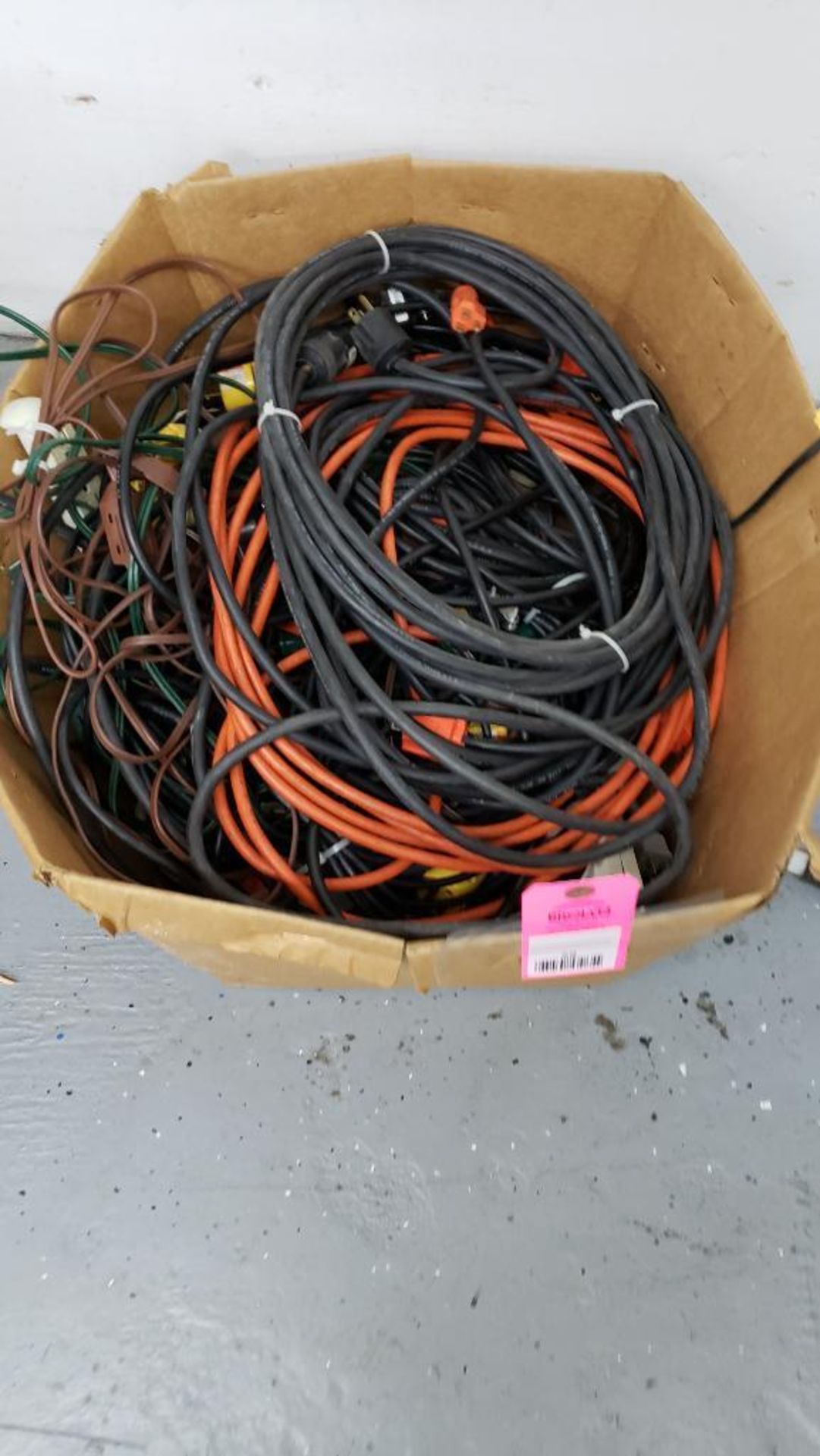 Large box of assorted extension cords.