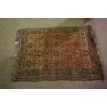 Persian Bluch Rug, Decorated with geometric motifs on an orange ground, 114cm x 80cm
