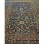 Shirvan Kuba Rug (Caucasian) Decorated with allover floral and geometric motifs on a red and blue