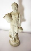 Stone Statue, Modelled as a female holding baskets, 72cm high