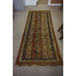Persian Bluch Rug, Decorated with allover geometric motifs on a multi coloured ground, 239cm x