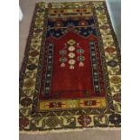 Yahyali Rug, Decorated with floral and geometric medallions on a red and beige ground, 180cm x