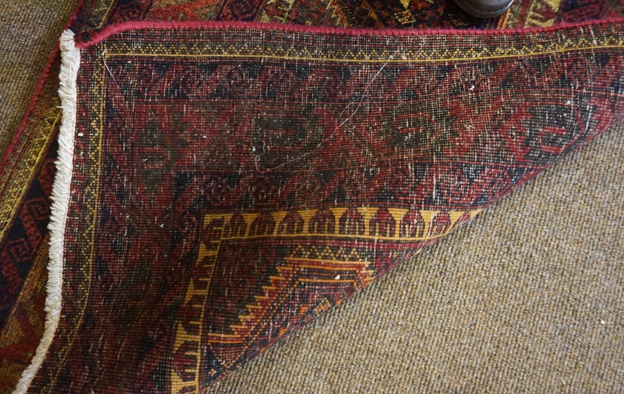 Bluch Prayer Mat / Rug, Decorated with five geometric medallions on a red ground, 122cm x 66cm - Image 3 of 3