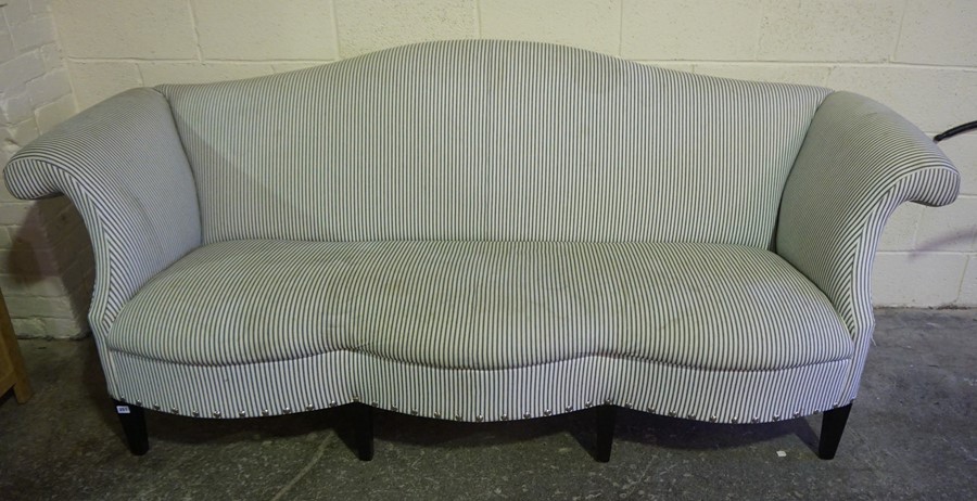 Upholstered Wing Back Three Seater Parlour Style Settee, raised on tapered feet, 83cm high, 242cm