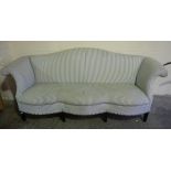 Upholstered Wing Back Three Seater Parlour Style Settee, raised on tapered feet, 83cm high, 242cm