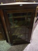 Mahogany Corner Cabinet, circa 19th century, Having a glazed astragal door enclosing a shelved