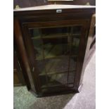 Mahogany Corner Cabinet, circa 19th century, Having a glazed astragal door enclosing a shelved