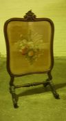 Victorian Rosewood Firescreen, Having a needlepoint floral panel on silk to the front, beneath