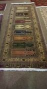 Herekeh Rug, Decorated with multicoloured geometric motifs on a cream and beige ground, 223cm x