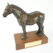 Prize Resin Figure of a Horse, 23cm high, raised on a plinth, with presentation label