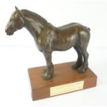 Prize Resin Figure of a Horse, 23cm high, raised on a plinth, with presentation label