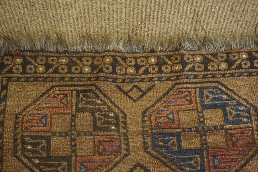 Persian Bluch Rug, Decorated with eight geometric medallions on a brown ground, 119cm x 94cm - Image 3 of 4