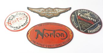 Four Cast Iron Motorbike Themed Wall Signs, to include signs for Harley Davidson and Norton, Largest