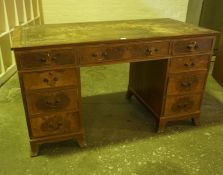 Mahogany Kneehole Desk, Having a tooled leather skiver above a central drawer, flanked with four