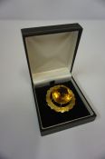 18ct Gold Citrine Brooch, the large citrine measuring approximately 2.5cm diameter, in a claw