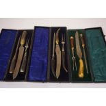 Three Boxed Sets of Three Horn Handled Carving Sets, (3)