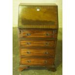 Ladies Mahogany Writing Bureau, Having a fall front above four drawers, 102cm high, 55cm wide,