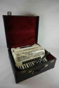 Piano Accordion by E Soprani, Decorated in faux mother of pearl, with case