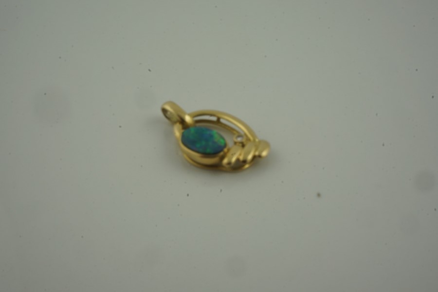 18ct Gold Fire Opal and Diamond Pendant, stamped 750, overall weight 1.6 grams, also with a pair