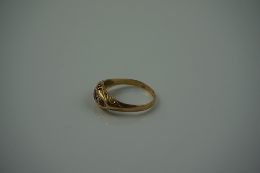 18ct Gold Ruby and Diamond Ring, Set with a ruby to the centre, flanked with smaller rubies and - Image 4 of 7