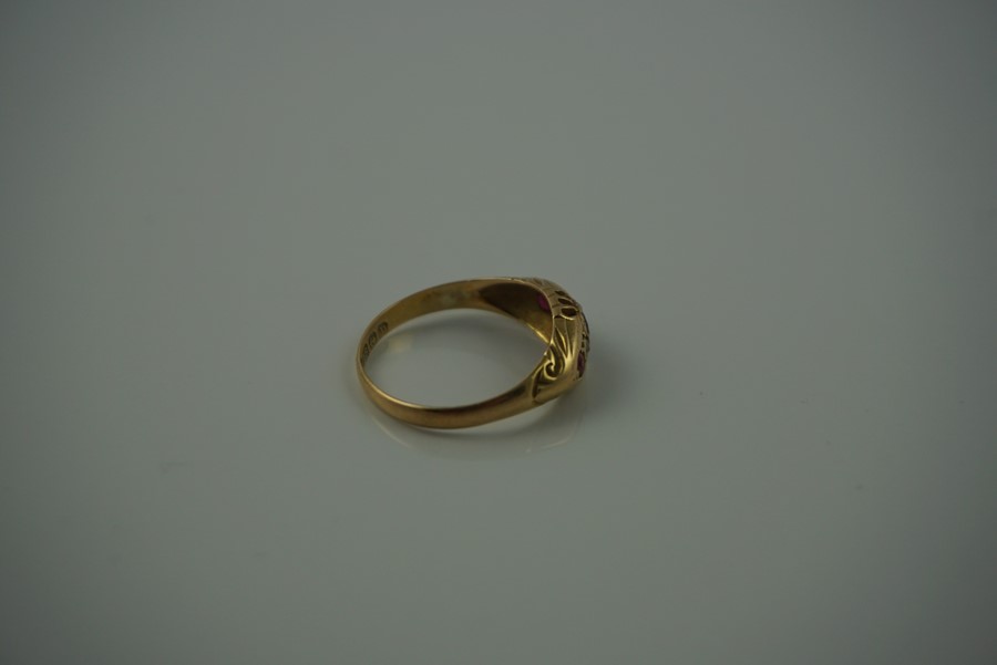 18ct Gold Ruby and Diamond Ring, Set with a ruby to the centre, flanked with smaller rubies and - Image 6 of 7
